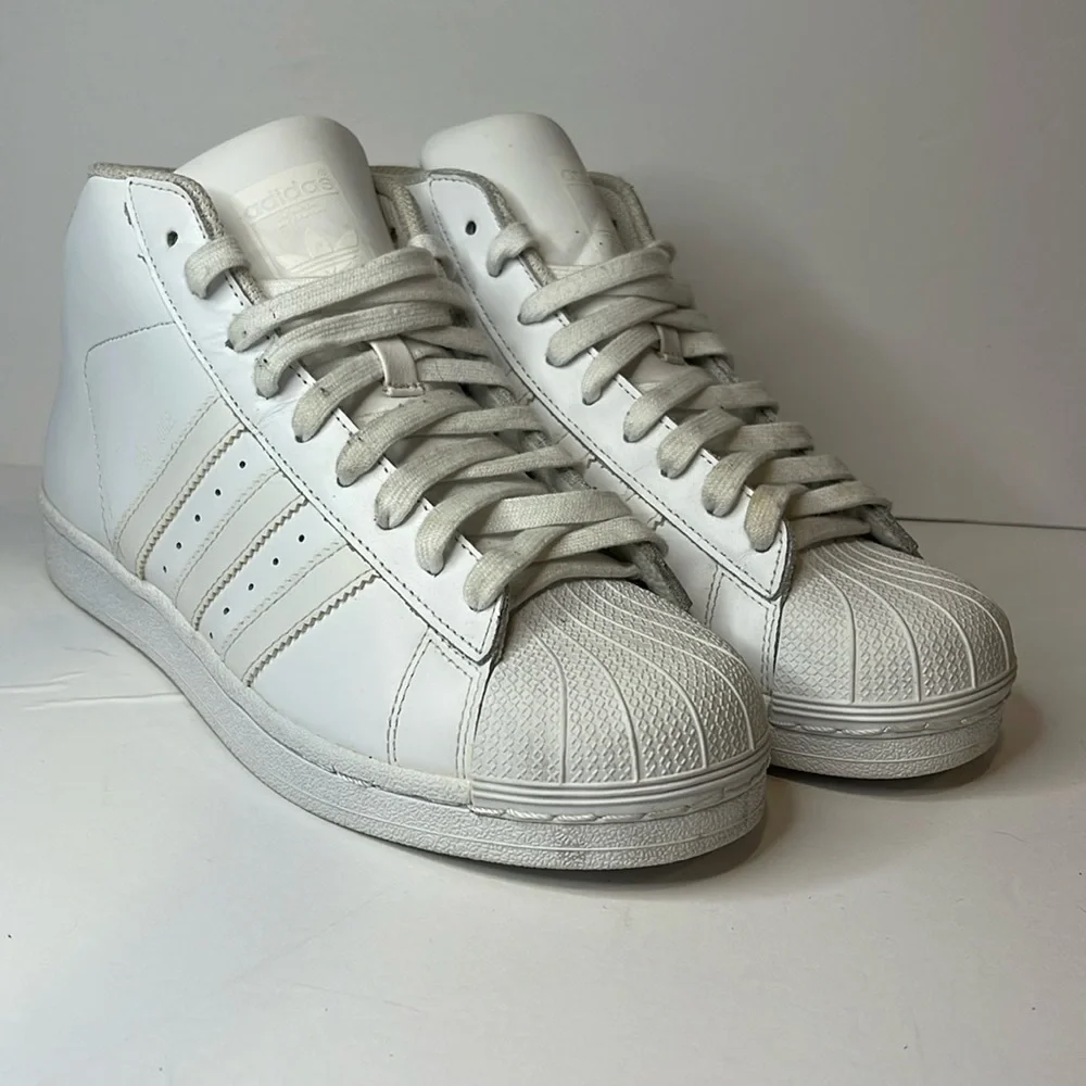 - Adidas White Pro Model High Top Sneakers